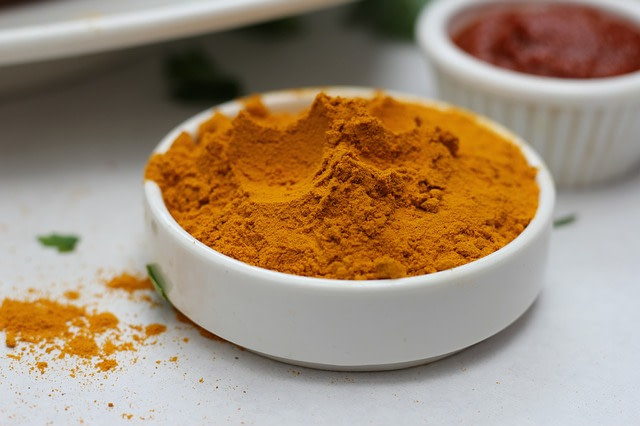 Turmeric powder in a container