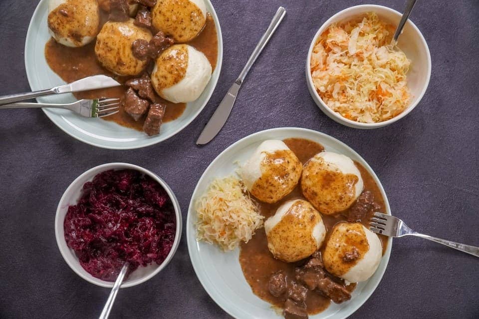 A meal with red and green cabbage sauerkraut
